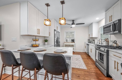 Russell House | Family Stay with Game Garage, Fire Pit, Streaming TVs and Private Yard