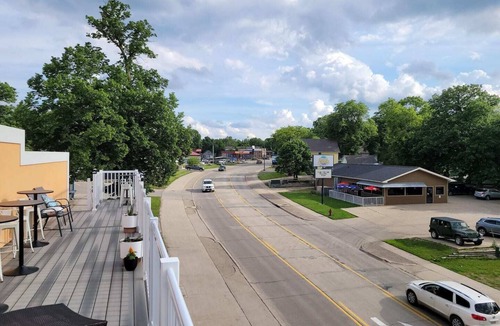 Arnolds Park Apartment | Fantastic Location-Roof Top Patio (shared) and King Bed This suite is on the 2nd level and requires guest to use stairs.