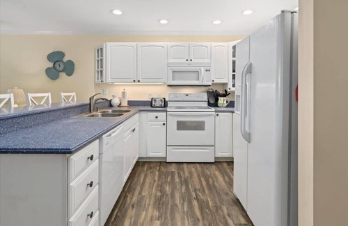 Heron Harbour Isle Condo | First Floor Waterfront Condo with Great Amenities