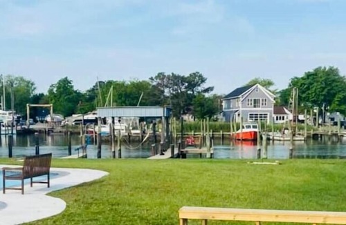 Tilghman House | Fish from the dock, swim in the pool, book now.