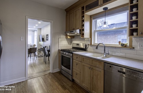 Irving Park House | Five bedroom, two bath single family home with plenty of living and dining space