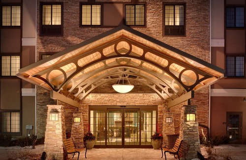 Omaha Condo | Free Breakfast. Pool. Gym. Close to the Children’s Hospital!
