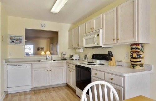 Ocean View Condo | FREE DAILY ACTIVITIES INCLUDED! Only a few miles from Bethany Beach this beautifully decorated second floor unit offers 2 bedrooms with 2 full baths and is nestled within unspoiled land and gently lapping inland waterways