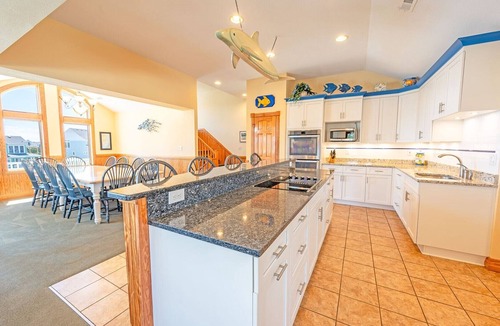 Buck Island House | Free pool heat, hot tub, elevator, chefs kitchen, gated community with tennis, lap pools, ocean f.