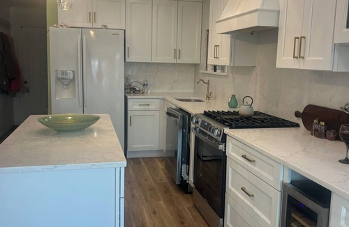 Mystic Island House | Fully upgraded gourmet kitchen waterfront backyard oasis lanai & gazebo