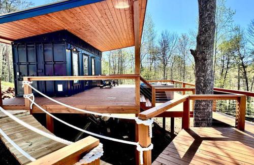 Hiawassee Villa | Glamping Container Treehouse by Hiawassee Glamping