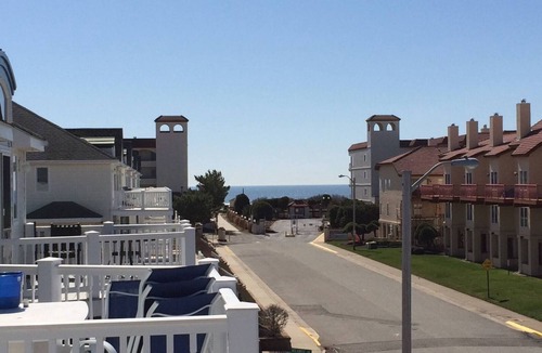 Diamond Beach Condo | Great location, ocean + bay view, seasonal heated pool, garage, bikes, modern