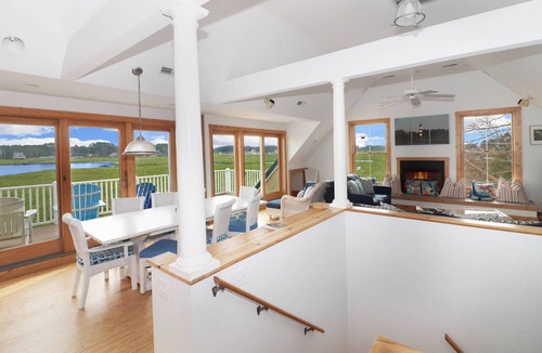 Deep Hole House | Heron's Cove on Salt Meadow | Bayfront Views, Dock, King Suites, Fireplace + Pet Friendly