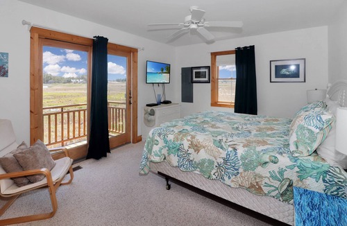 Deep Hole House | Heron's Cove on Salt Meadow | Bayfront Views, Dock, King Suites, Fireplace + Pet Friendly