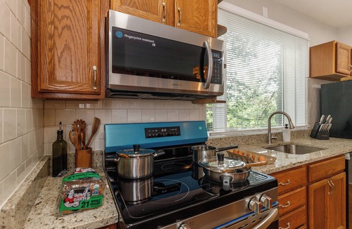 Gwynn Oak House | Hilltop Retreat w/Pool, Games & Sunroom