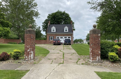 Bloomfield Apartment | Historic Steckel carriage house with picturesque landscaping