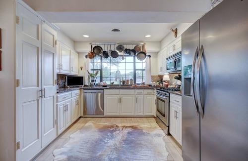 Central Oklahoma City Villa | Historic Villa🚶1 min from Lake Hefner🏊 Hot Tub 🎱Pool Table🐶Friendly🎣Fishing