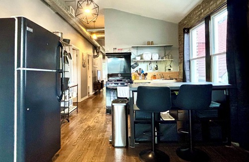 Chicago Apartment | Industrial Loft 2BR + DRUM KIT + Exposed Brick + 2 Private Decks & Lush Backyard