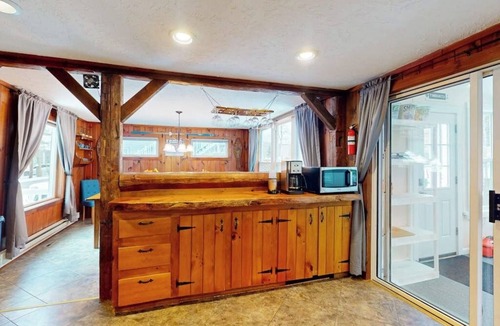 Montgomery Center House | Inviting riverfront home with hot tub on deck & fireplace, near skiing & golf