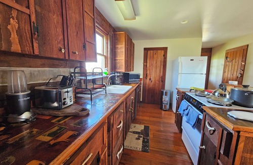 Winchester House | Just minutes from downtown Winchester, explore 62 scenic acres with roaming peacocks, horses, cows, and sheep. Enjoy a petting zoo or horse riding lessons for an unforgettable farm adventure!