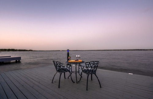 April Sound House | Karaoke,Arcade,Firepit,PrivateDock,Projector,Kayaks,SUP,Fishing,Massage,Mixology