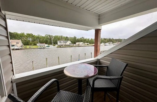 Coinjock Apartment | Knot One- Balcony View of ICW- Dog Friendly!