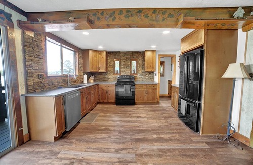 Alpine Bay House | Lake Front Castle with Mini Golf/Pickleball/Arcade/Sleeps 18