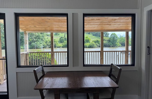 Alexander City House | Lake front & pool front with two boat slips, playground, grill station & canoes.