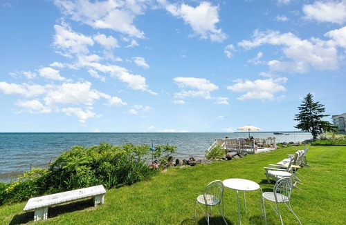 Au Gres House | Lake Huron Beach Retreat has 3 bedrooms and 2 full baths with a sandy beach!