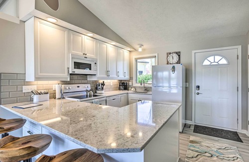 LaPlatte I Cabin | Lakefront Bellevue Home: Private Beach & Fire Pit!