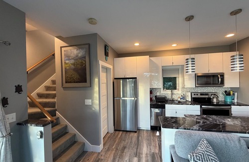 Turtle Lake House | Lakefront Luxury Modern Home With Docks, Fire Pit & Pontoon Boat Rental