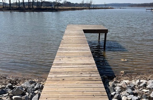 Lincoln RV Rental | Lakeside Comfort: Covered RV Site with Private Pier #1