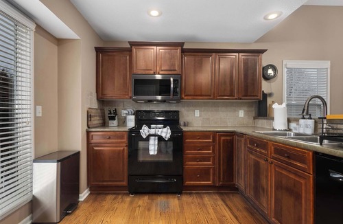 Olathe House | Large 5 Bedroom House with Private Backyard Oasis