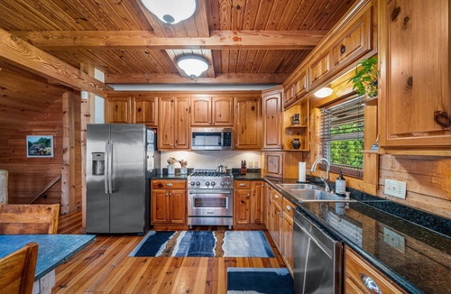 Mentone Cabin | Large authentic 3-story log cabin adjacent to lake. Up to 14 guests.