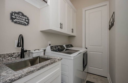 Evans House | Large, Luxury, Family-Sized Home with Game Room, Screened Porch & Exercise Area