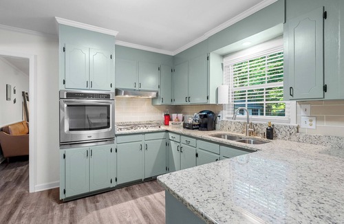 Simpsonville House | Lights, camera… vacation! Your blockbuster stay awaits in downtown Simpsonville.