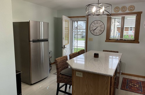 Two Rivers House | Lovely Riverfront views of river. Walking distance to beach. 🚴👙🐠