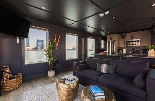 Inner Harbor Boat Rental | Luxe Black Houseboat: Inner Harbor Skyline Views