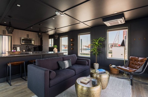 Inner Harbor Boat Rental | Luxe Black Houseboat: Inner Harbor Skyline Views