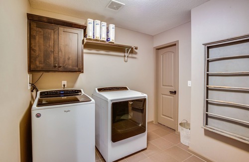 Jackson County House | Luxe Missouri Getaway w/Hot Tub & Fire Pit!