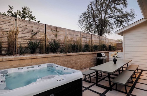 East MLK House | Luxe Two-Story Austin Retreat | Hot Tub