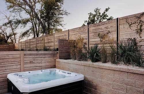 East MLK House | Luxe Two-Story Austin Retreat | Hot Tub