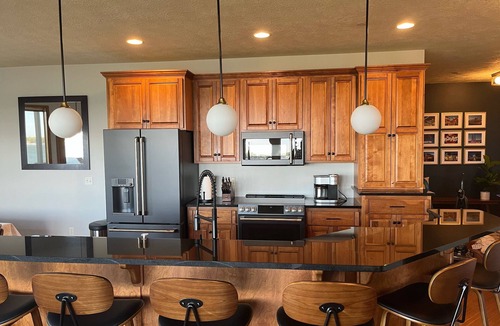 Arnolds Park Condo | Luxurious Lakefront BB Corner Condo. Panoramic lake views & 6 waterpark passes.