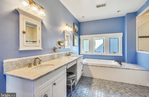 Arundel on the Bay Condo | Luxury Waterfront home with private pier and guest house
