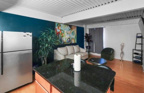 Downtown Omaha House | Modern 1BR Midtown Omaha, Garage for 2, Rooftop, W/D, Smart TV, 1 Gbps