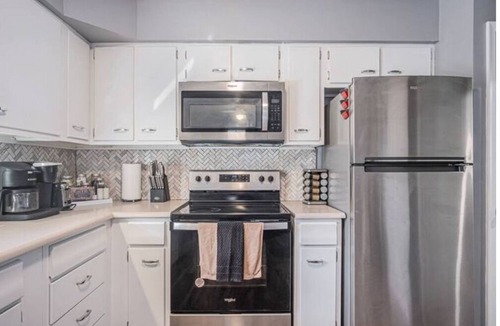 North Central Omaha House | Modern 4BR NW Omaha, Garage, Fenced Yard, EV Charger, W/D, Pet-Friendly