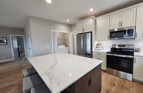 Booneville House | Modern home on acreage with pond, trails, rolling hills, and sunset views