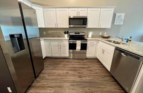 West Omaha Condo | Modern Townhouse w/Private Backyard & Patio Retreat