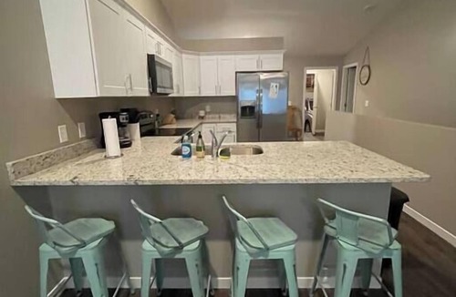 West Omaha Condo | Modern Townhouse w/Private Backyard & Patio Retreat