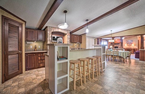 Powell House | Monett Family Ranch Home w/Fireplace & Huge Deck!