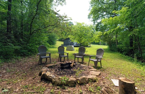 Newport Cabin | Moonshine Cabin with a nice yard on the creek in the shadows of the Smokies