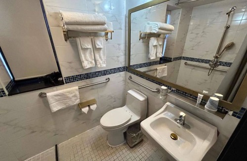 Chinatown Hotel | Near Wall Street Ferry | Fitness Center + Perks