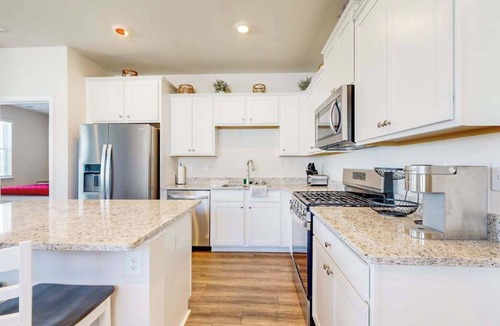 Millville House | Newly remodeled - dog friendly townhome with pools, tennis, washer/dryer & AC