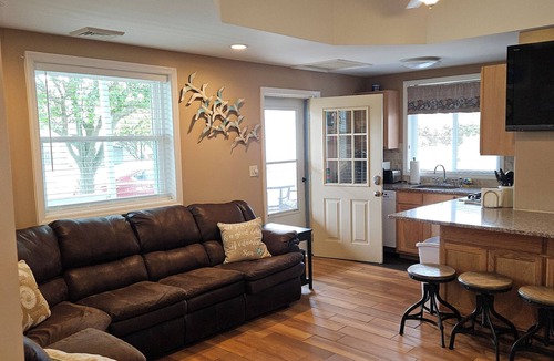 Wildwood Crest Condo | Ocean breezes, porch dining, and your favorite drink await