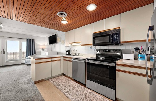 Sunset Island Condo | Ocean front condo with pool in Ocean City, Md. sleeps 5, elevator, large balcony